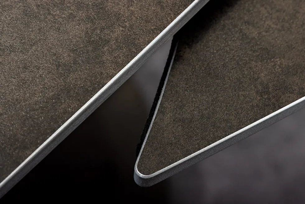 Ausziehbarer Esstisch INCEPTION 130-190cm rost oval Keramik bronze Gestell