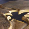 Dekorativer Couchtisch GINKGO 95cm gold schwarz handmade Metall