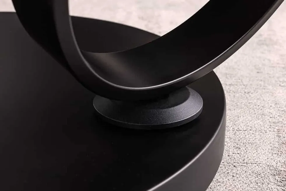 Design Couchtisch DANCING RINGS rost rund drehbar Travertin Keramik schwarz Gestell