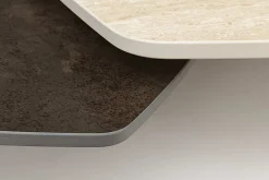 Design Couchtisch MOVEMENT rost Pentagon drehbar Travertin Keramik schwarz Metall