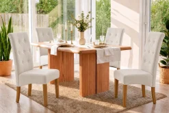 Design Stuhl CASA beige Leinen Massivholzbeine mit Zierknöpfen und Nackenrolle
