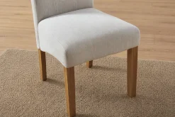 Design Stuhl CASA beige Leinen Massivholzbeine mit Zierknöpfen und Nackenrolle