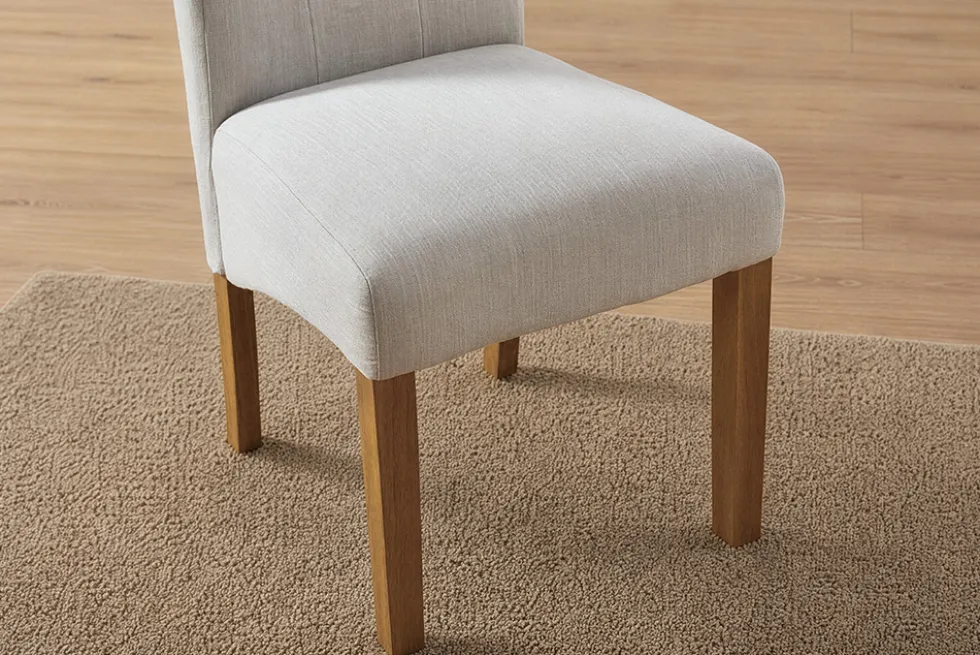 Design Stuhl CASA beige Leinen Massivholzbeine mit Zierknöpfen und Nackenrolle