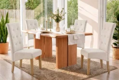Design Stuhl CASA beige Strukturstoff Massivholzbeine mit Zierknöpfen und Nackenrolle