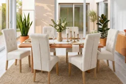 Design Stuhl CASA beige Strukturstoff Massivholzbeine mit Zierknöpfen und Nackenrolle