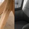 Drehbarer Stuhl ALMARA schwarz Echtleder 360° Taschenfederkern natur Eiche Massivholz