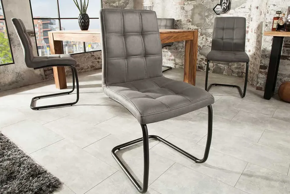 Industrial Freischwinger Stuhl MODENA vintage grau mit Ziersteppung