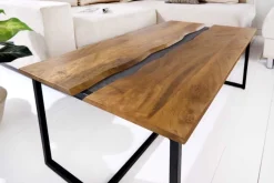 Massiver Couchtisch AMAZONAS 110cm Mangoholz Metall schwarz Baumkante Honey Finish