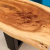 Massiver Couchtisch LIQUID 110cm braun Akazienholz Baumkante schwarz Eisen blau