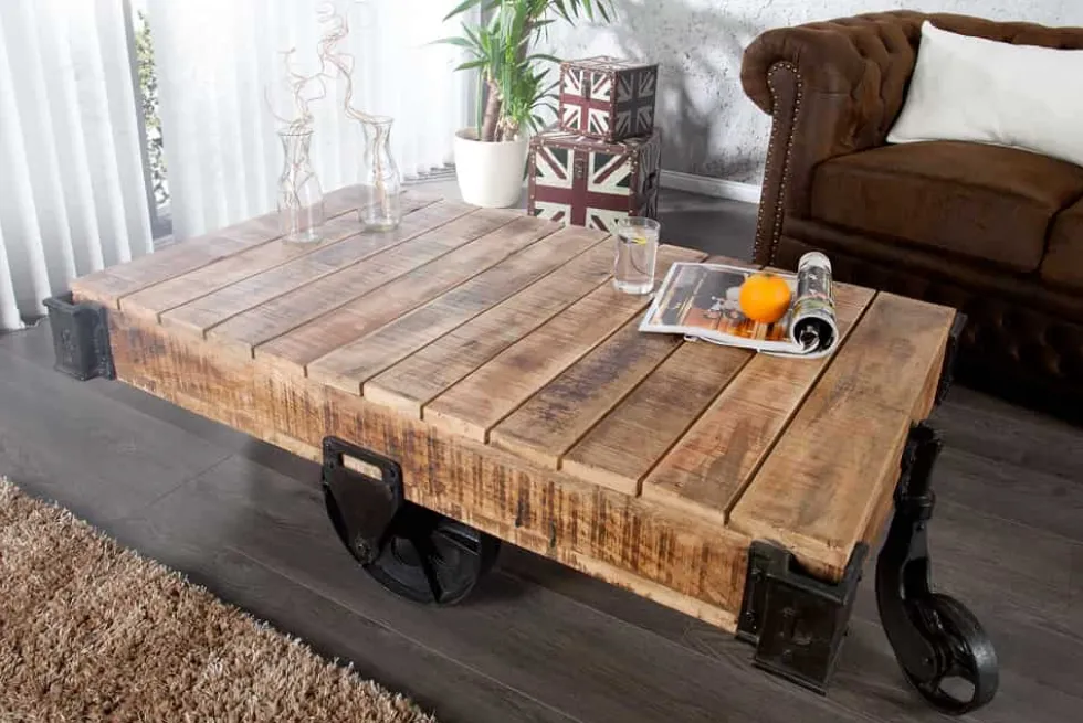 Massiver Design Couchtisch RAILWAY 110cm Mangoholz mit 4 Rädern
