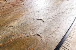 Massiver Esstisch MOUNTAIN SOUL 240cm rötlich grün schwarz oval Naturstein Eisen