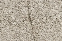 Moderner Hocker SCANDINAVIA champagner greige Bouclé schwarze Metallbeine Fußhocker