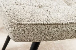 Moderner Hocker SCANDINAVIA champagner greige Bouclé schwarze Metallbeine Fußhocker