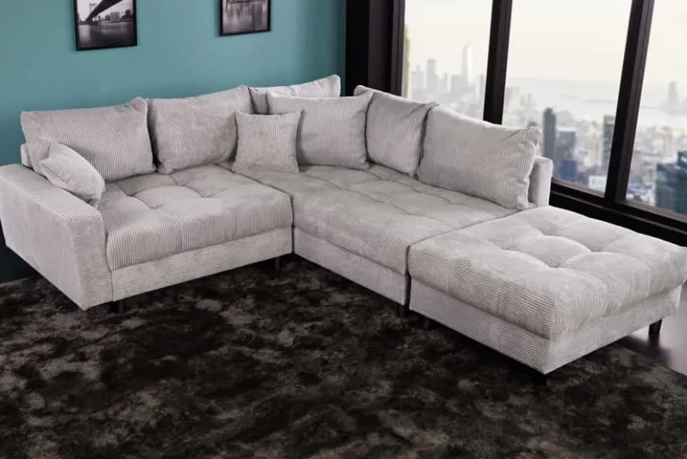 Modernes Ecksofa KENT 220cm hellgrau Cord inkl. Hocker Federkern L-Form Wohnlandschaft