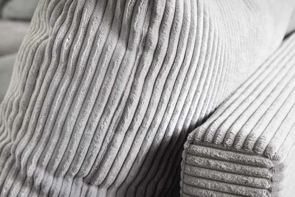Modernes Ecksofa KENT 220cm hellgrau Cord inkl. Hocker Federkern L-Form Wohnlandschaft