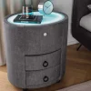 Nachttisch SIGNUM 55cm oval grau Vogue Seiden Samtstoff inkl. Beleuchtung Schubladen