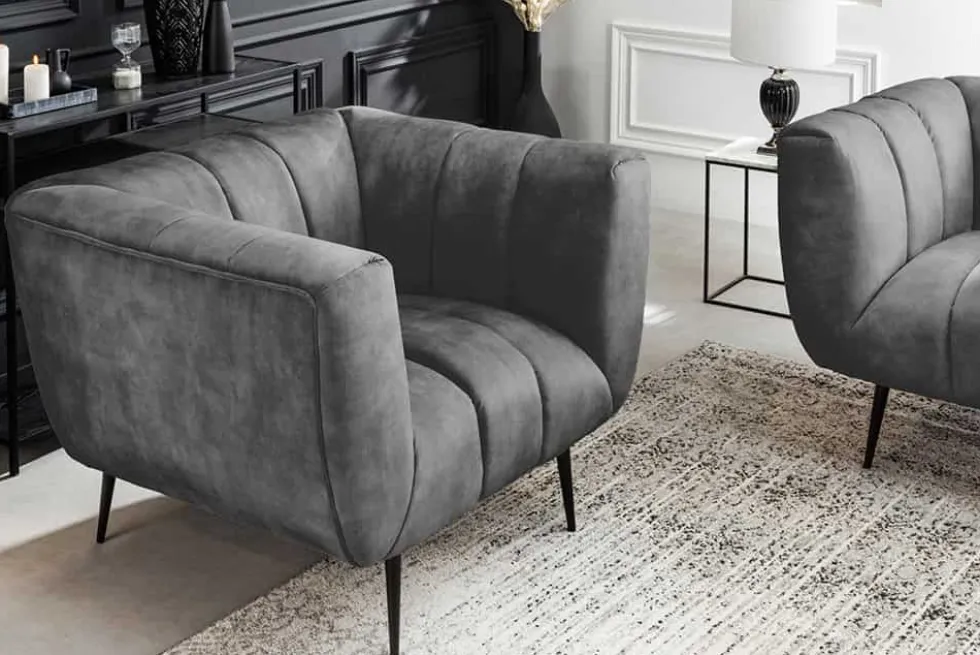 Retro Sessel NOBLESSE 105cm grau Samt schwarze Metallfüße Federkern Ziersteppung